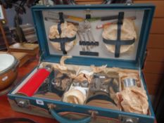 VINTAGE 'SIRRAM' PICNIC HAMPER in blue faux leather case, together with cover and contents including