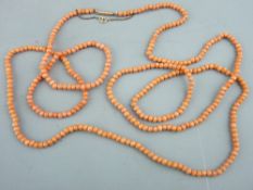 A CORAL BEAD NECKLACE, 130cms long with a 9ct gold clasp, 36gms