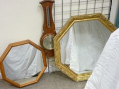 A GILT FRAMED OCTAGONAL SHAPED WALL MIRROR, one other and a modern mahogany banjo shaped wall