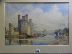 JOHN E AITKEN watercolour - the harbour at Caernarfon with numerous boats alongside Eagle Tower,