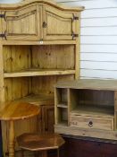 A REPRODUCTION PINE DOME TOP CORNER CUPBOARD with twin top doors, centre shelves over two base