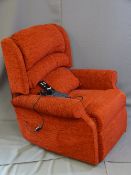 A RED CHENILE ELECTRIC RECLINING ARM CHAIR E/T