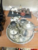 A FOUR PIECE WHITE METAL TEA SERVICE on tray, a composition model of a duck and an advertising