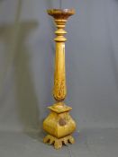 A LIGHTWOOD CARVED COLUMN TORCHERE