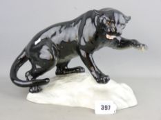 A LARGE BESWICK POTTERY MODEL OF A BLACK PANTHER, No 1702, original stick on label attached, 21.5cms