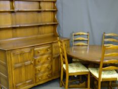 AN ERCOL MEDIUM COLOUR DINING SUITE consisting of dresser with four central drawers flanked by two
