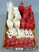 A CHINESE CARVED AND STAINED IVORY PART CHESS SET circa 1890, 11cms height the King