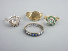 A 9CT WHITE GOLD BLUE STONE SET ETERNITY RING, a 9ct yellow gold dress ring, a gold on silver signet