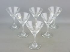 A SET OF SIX COCKTAIL GLASSES marked 'The Babycham Co' all having twist stems, 14cms heights