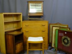 FOUR VINTAGE FIRE SCREENS, two lightwood book cases, a wall hung toilet mirror with locker, a