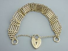 A 9CT GOLD GATE LINK BRACELET with chase decorated padlock clasp, 24gms gross