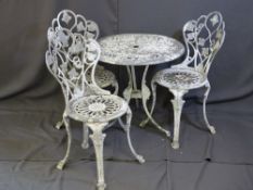 A 70 CM DIAMETER CAST METAL GARDEN TABLE with three chairs (for restoration)