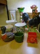 A LARGE POTTERY COCKEREL, a hand painted Poole pottery jardiniere with others and stands, a wicker