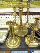 FIVE VARIOUS 18TH CENTURY SEAMED BRASS CANDLESTICKS, various measurements