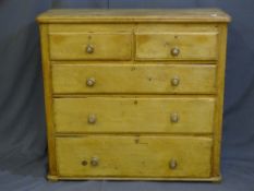 A PINE TWO OVER THREE DRAWER CHEST - 120cms width, 51cms depth, 112cms height
