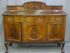 A MAHOGANY RAIL BACK SIDEBOARD with pie crust detail, two drawers over three base cupboards with