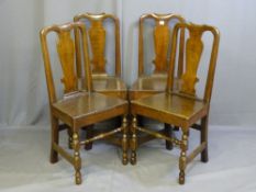 A SET OF FOUR WELL COLOURED OAK COUNTRY CHAIRS with shaped centre splats on turned and block