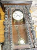 A VICTORIAN VIENNA STYLE PENDULUM WALL CLOCK