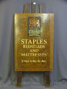 A VINTAGE ADVERTISING EASEL with coat of arms and 'Staples and Co Ltd By Appointment to H.M. The