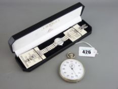 A GERMAN MILITARY ISSUE NICKLE CASED STOP WATCH the case back stamped with third Reich emblem