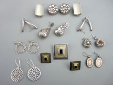 AN ATTRACTIVE PARCEL OF NINE PAIRS OF SILVER/WHITE METAL EARRINGS, 86gms total (2.7 troy ozs)