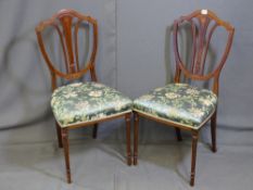 A PAIR OF INLAID MAHOGANY SHIELD BACK SALON CHAIRS with classically upholstered seats on reeded