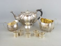 A MIXED GROUP OF SILVER ITEMS to include a Sheffield tea pot, indistinct date, a George III two