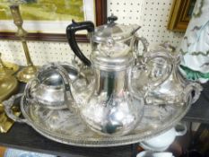 A VICTORIAN THREE PIECE TEA SERVICE with bright decoration, a litre hot water jug and a two