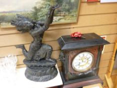 A GOOD VICTORIAN RED & BLACK MARBLE MANTEL CLOCK with lion's mask side detail, the dial having
