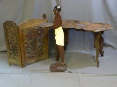 A CARVED WOOD PAINTED DOOR WAITER along with an Anglo Indian lotus table and fire screen