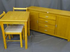 A MODERN LIGHT WOOD SQUARE TOPPED TABLE and two matching upholstered chairs along with a similar