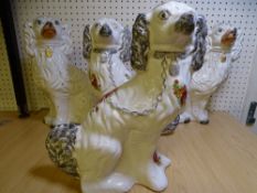TWO PAIRS OF STAFFORDSHIRE COMFORTER DOGS