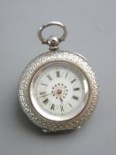 A LADY'S 935 SILVER KEY WIND FOB WATCH, fine delicately encased with Roman numerals and gold