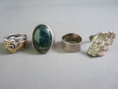 A PARCEL OF FOUR VARIOUS WHITE METAL DRESS RINGS, total 21.5gms