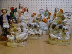 A COLLECTION OF STAFFORDSHIRE flat back figures and spill holders