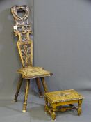 A CARVED SPINNING CHAIR and similar carved foot stool