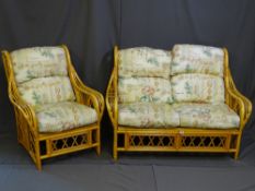 A MODERN TWO PIECE WICKER AND BAMBOO CONSERVATORY SUITE with cushions