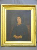 A LATE 19TH/EARLY 20TH CENTURY oil on canvas - portrait (relined) of a young seated lady in a