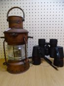 A VINTAGE 'ANCHOR' BRAND COPPER LANTERN and a pair of Vega Two 8 x 40 field binoculars