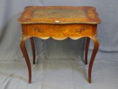A FRENCH MARQUETRY INLAID WRITING TABLE, the shaped top with tooled leather inset and inlaid