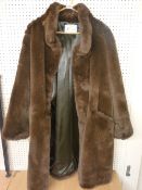 A HARRODS KNIGTSBRIDGE FULL LENGTH LADY'S FAUX FUR COAT, size 8