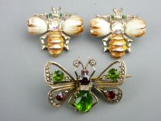 A PAIR OF AGATE STYLE BEE BROOCHES with tiny emerald style eyes and a yellow metal based butterfly