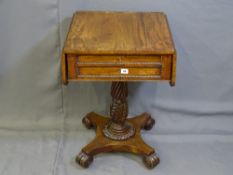 A REGENCY MAHOGANY WRITING TABLE with twin flaps and twin end drawers with writing surface