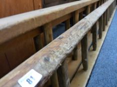 AN EXTENDING SET OF WOODEN LADDERS and a single run rustic example, 300 and 400cms lengths approx