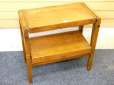 A VINTAGE OAK TWO TIER METAMORPHIC TABLE, 8cms height, 68.5cms width, 33cms depth closed