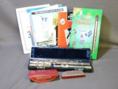 A LAFLEUR MODEL 82990, CASED FLUTE, a M Hohner Chrometta 10 harmonica along with a quantity of music