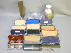 VINTAGE SPECTACLES IN CASES, a circular rim collection, an Eastern style brass tulip vase, one other