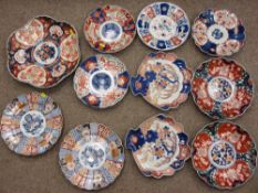 IMARI PLATES, a fan shaped pair, two other pairs and a quantity of other Imari plates
