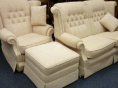 TWO PIECE LOUNGE SUITE comprising a well maintained floral, oatmeal upholstery two seater winged