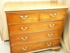 AN EARLY 19TH CENTURY MAHOGANY CHEST of two short over three long drawers, oak lined with cock